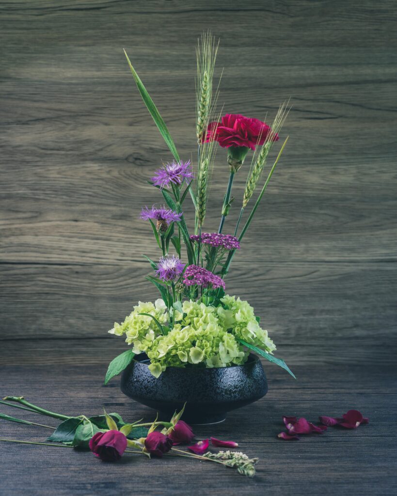 Ikebana Flower Arrangement with Green and Pink Flowers