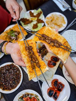 Overhead Photo of Meat Skewers on Flatbreads